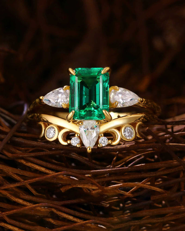 Stackable ring set with emerald-cut lab-grown emerald and moissanite accents on gold bands