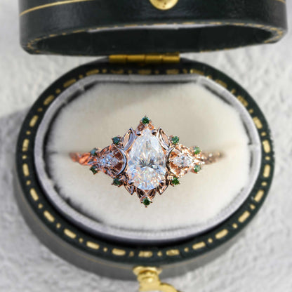 Belinor pear-shaped moissanite ring with side stones in vintage style box