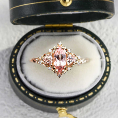 Nestariel solitaire engagement ring with marquise-shaped sapphire in vintage box