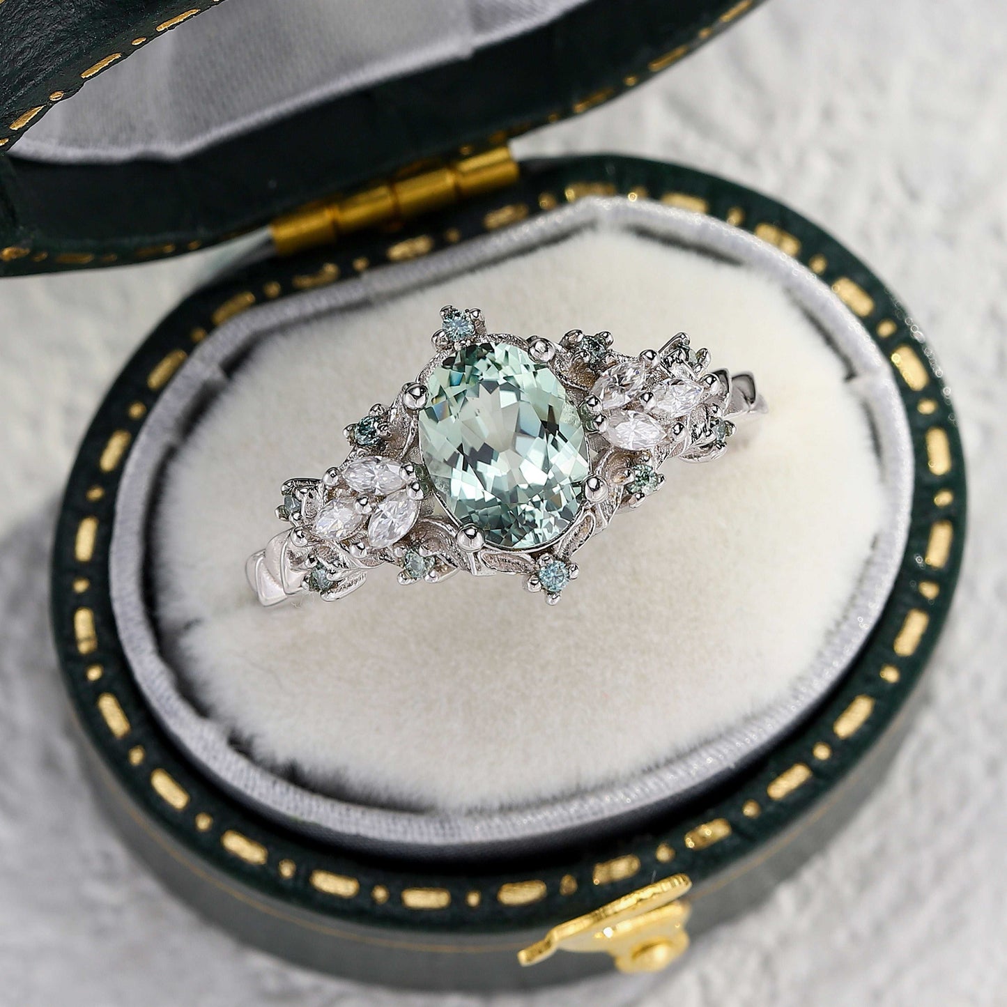 Tyranel engagement ring with 6x4mm oval sapphire and marquise round moissanite halo in elegant antique box