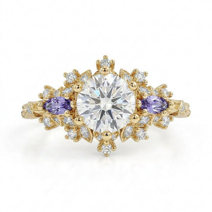 Rilaswen ring with round moissanite center stone and two smaller accented stones in elegant setting