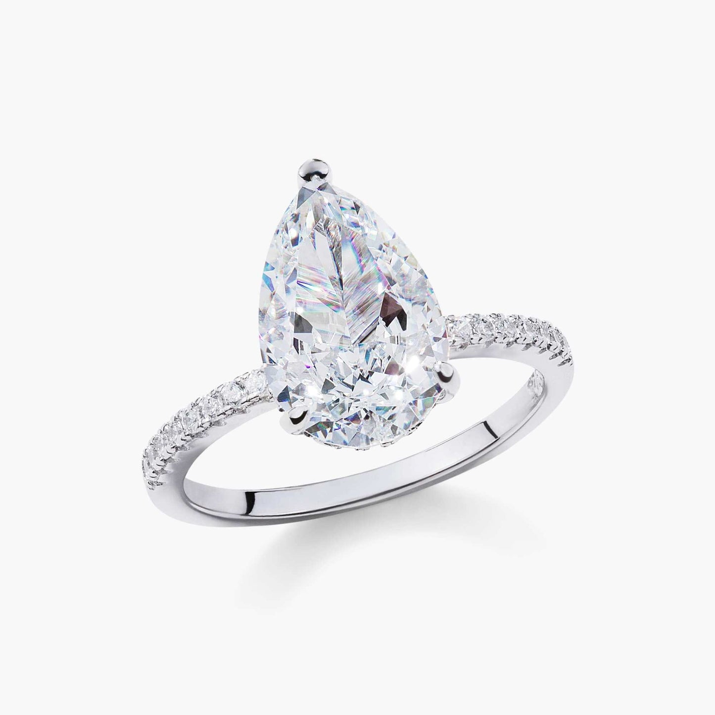 Kylariel pear-shaped moissanite engagement ring with half pavé band and hidden halo in white gold