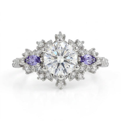 Rilaswen ring with round moissanite center stone and two accent stones on finger