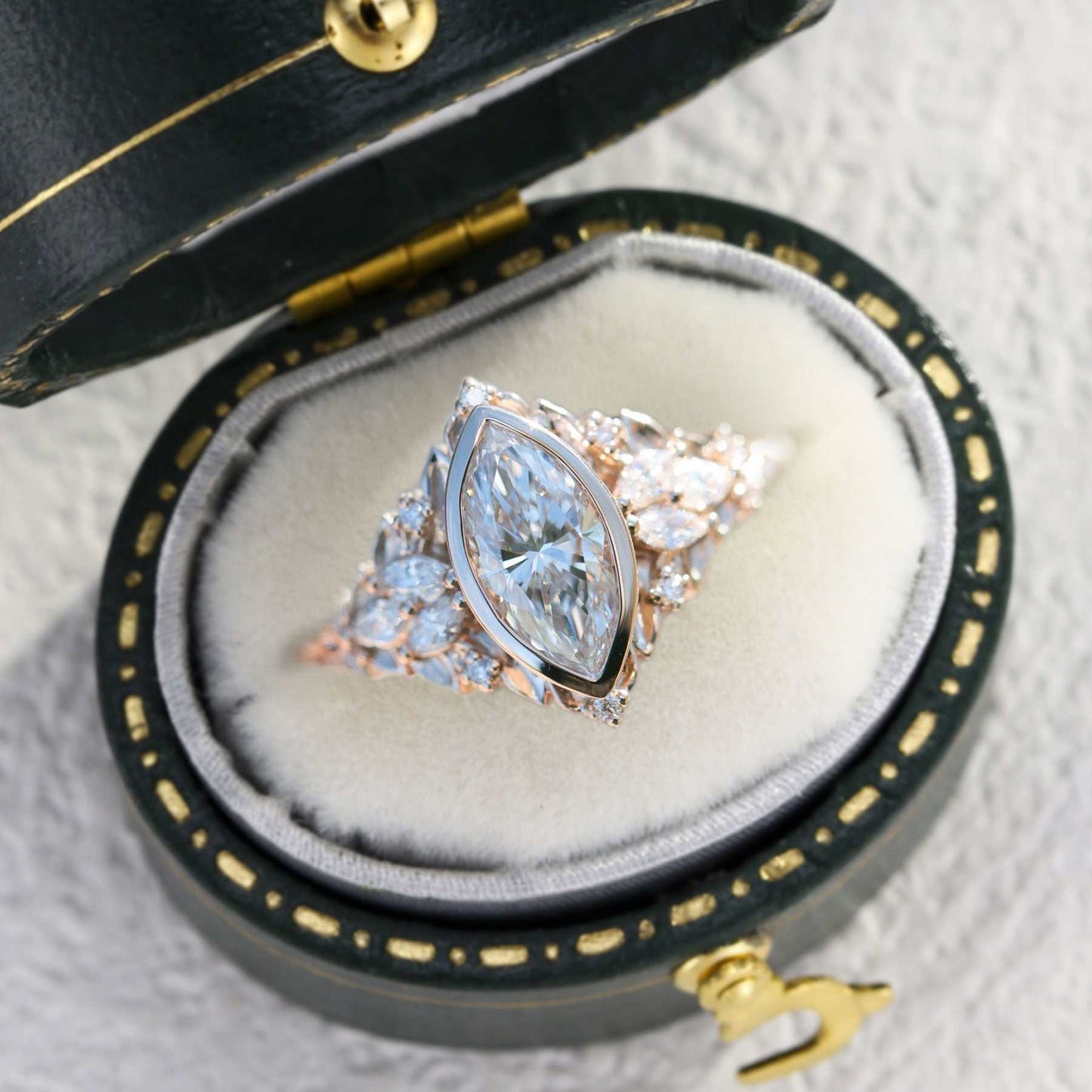 Uthawen solitaire engagement ring with marquise moissanite center stone in elegant jewelry box