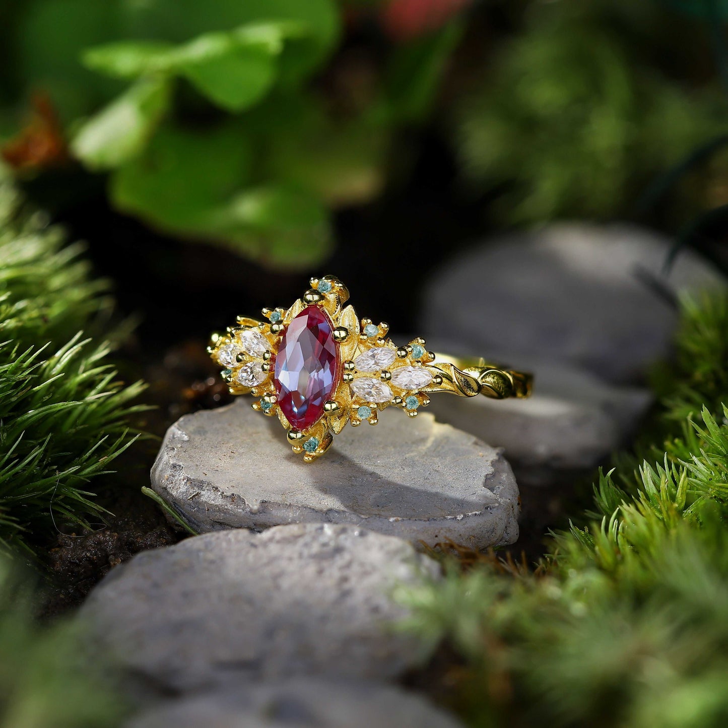 Lysaniel solitaire engagement ring with marquise lab Alexandrite and moissanite side stones on gold band