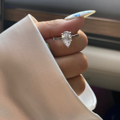 Daeloria 1.5 Carat Pear Solitaire Moissanite Ring