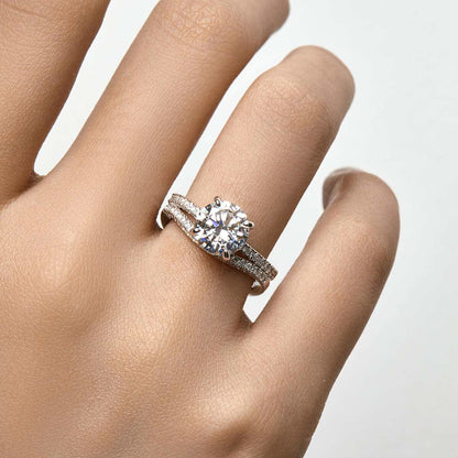 Ysinwen ring with round moissanite stone and pave band on hand