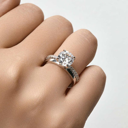Ysinwen ring with round moissanite stone and pave band on hand
