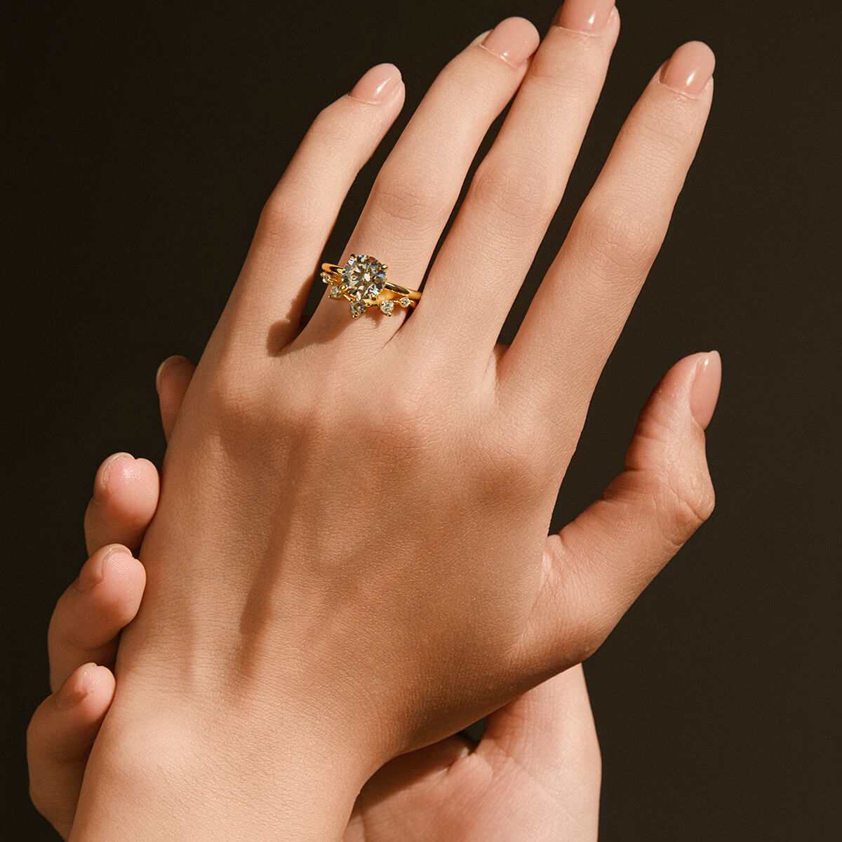 Zaelawen gold ring with 2-carat round moissanite stone and hidden halo on hand