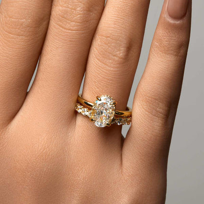 Nolindra solitaire engagement ring with oval Moissanite and pavé hidden halo on hand
