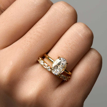 Nolindra solitaire engagement ring with oval Moissanite and pavé hidden halo on gold band