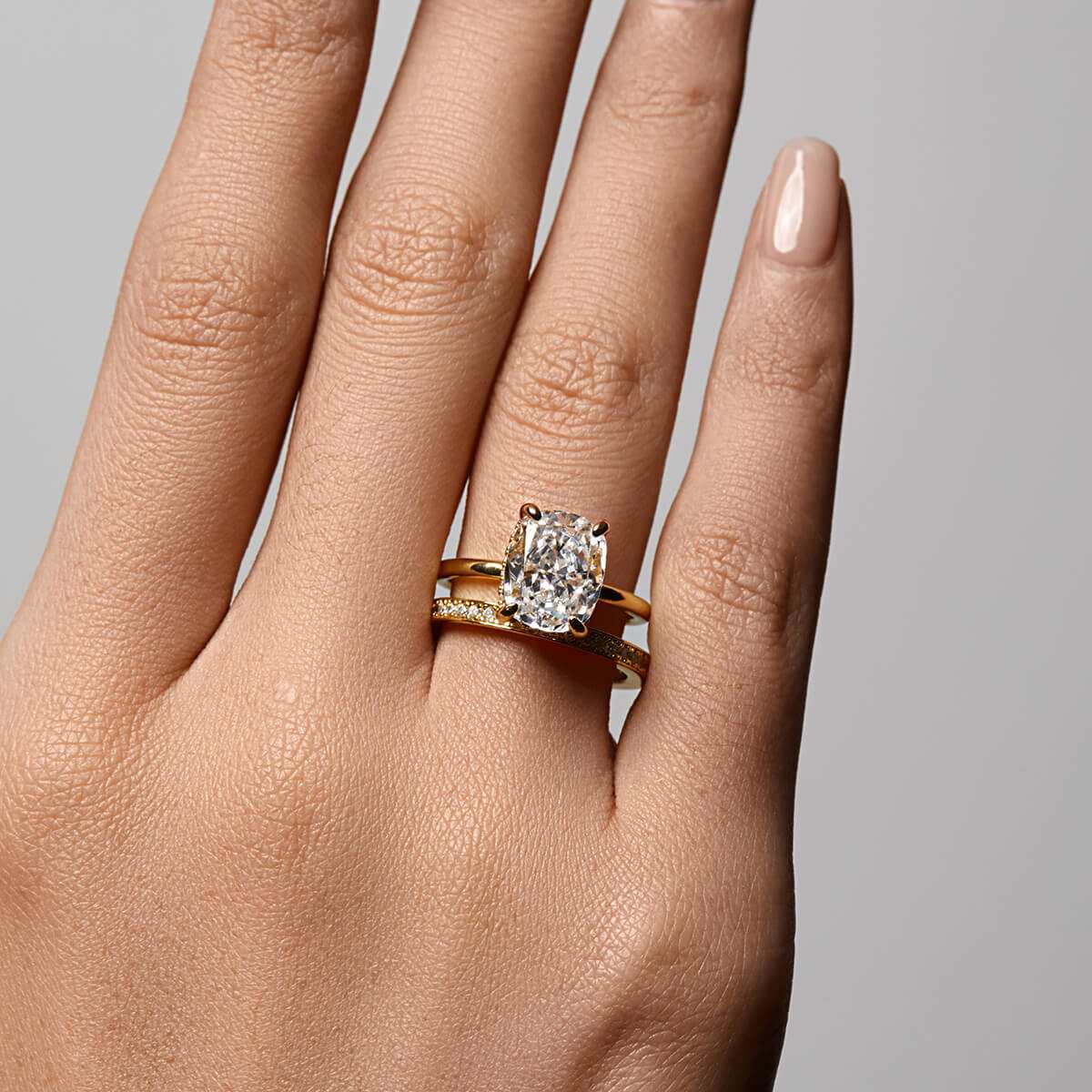 Lirawen ring with 3.5 ct cushion-cut moissanite and hidden halo on hand