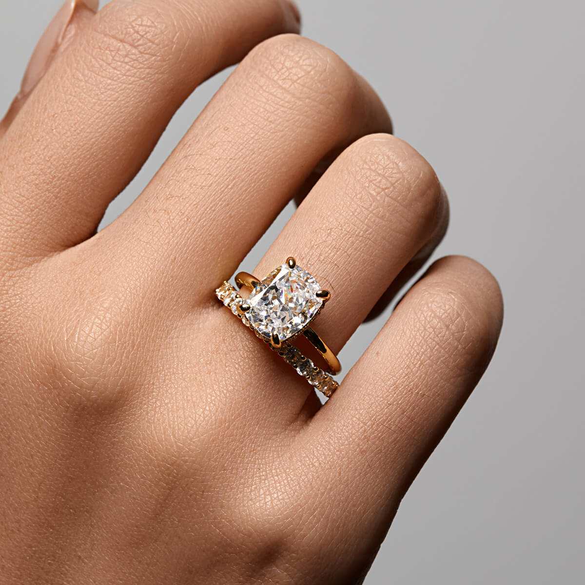 Lirawen ring with 3.5 ct cushion-cut moissanite and hidden halo solitaire design on hand