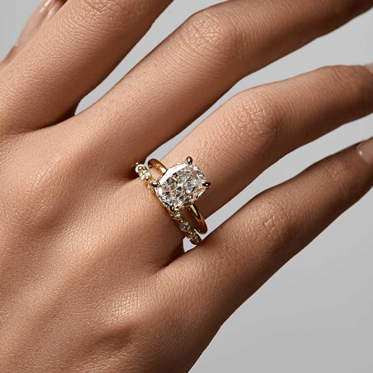 Lirawen ring with 3.5 ct cushion-cut moissanite and hidden halo solitaire design on hand