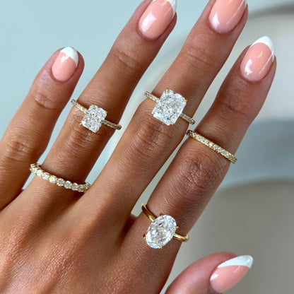 Raelawen 0.2 Carat Round Brilliant Eternity Moissanite Band in 18K Yellow Gold