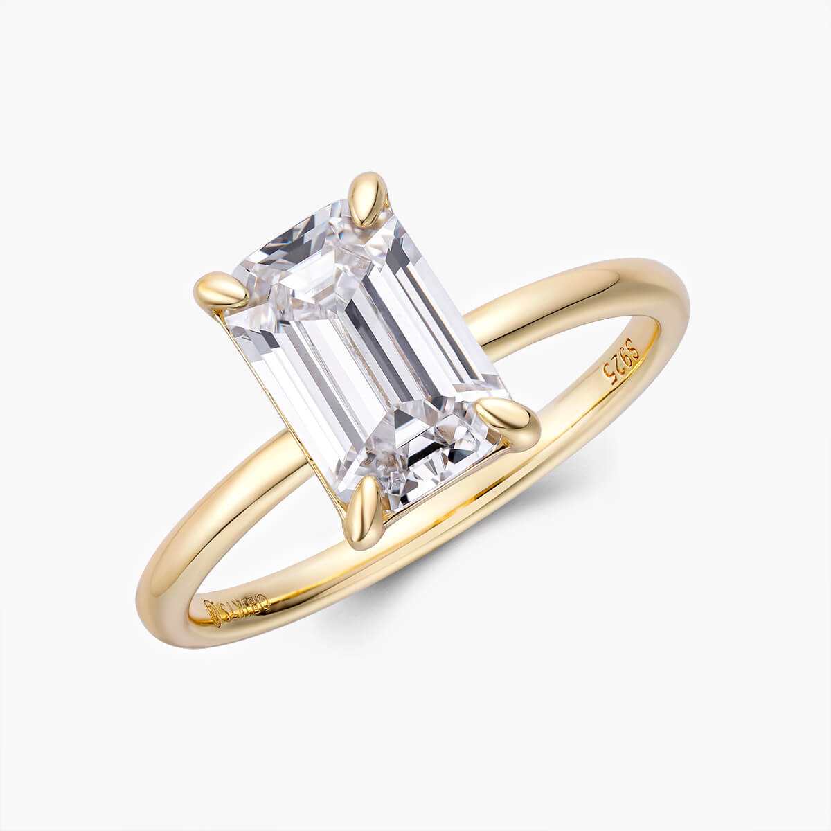 Beleria Emera Ring with emerald-shaped moissanite stone and gold solitaire band