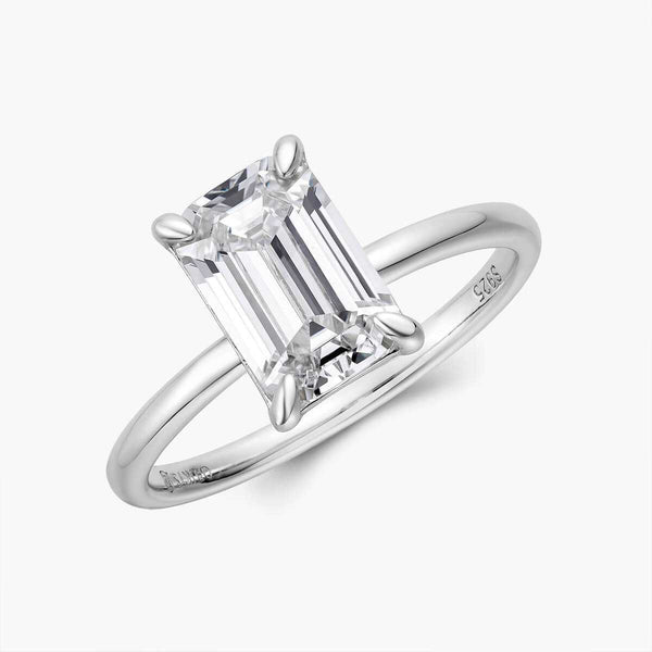 Emera ring with emerald-shaped moissanite stone and sleek plain band solitaire design