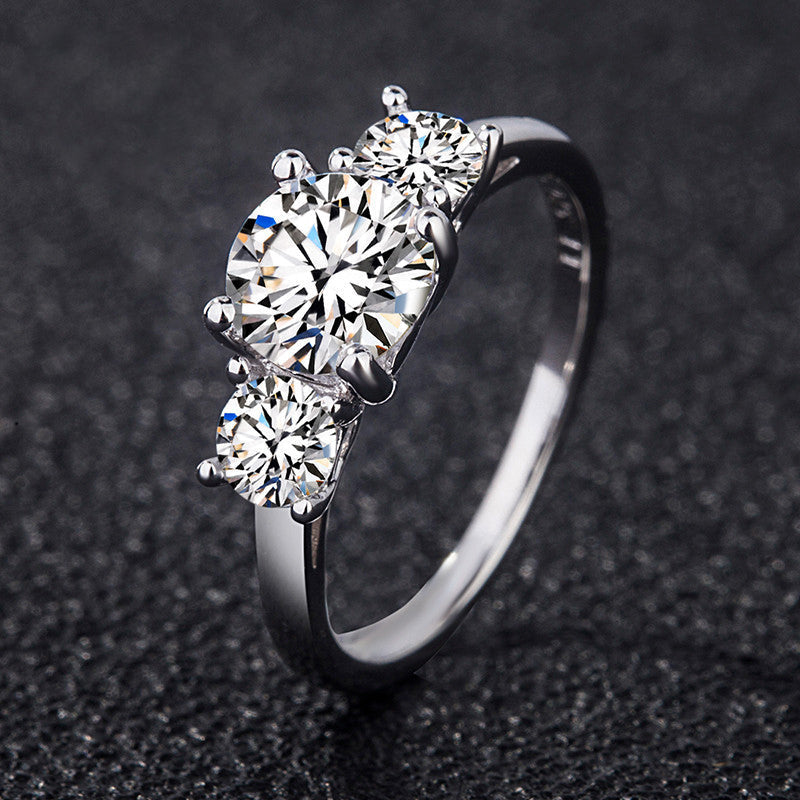 Cariniel 4 Carat Round Brilliant Three-stone Moissanite Ring