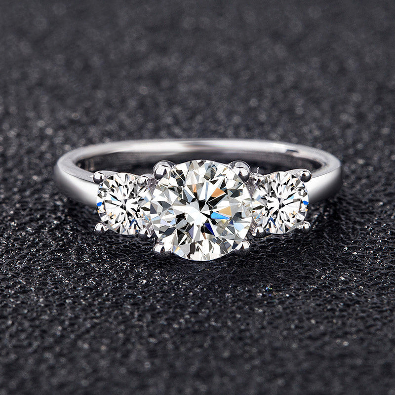 Cariniel 4 Carat Round Brilliant Three-stone Moissanite Ring