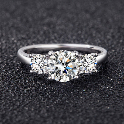 Cariniel 4 Carat Round Brilliant Three-stone Moissanite Ring