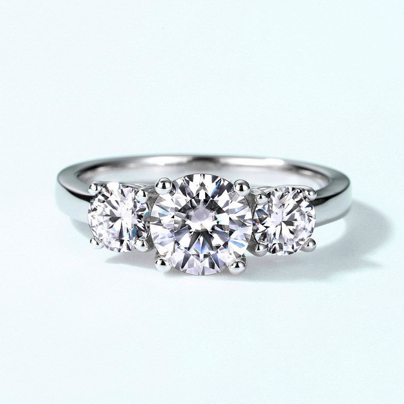 Cariniel 4 Carat Round Brilliant Three-stone Moissanite Ring