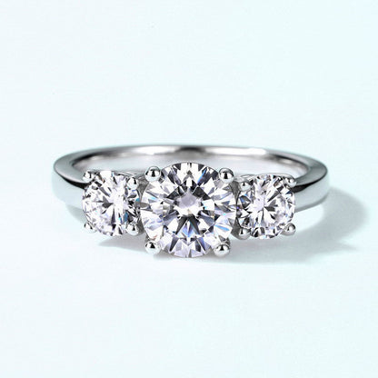 Cariniel 4 Carat Round Brilliant Three-stone Moissanite Ring