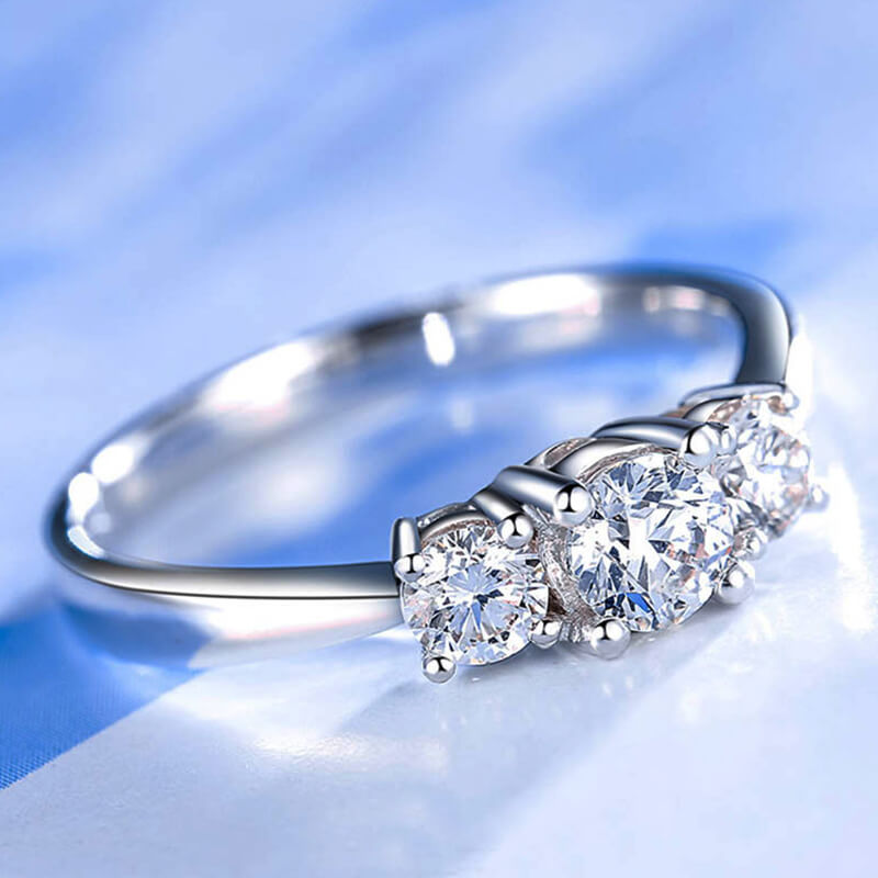 Cariniel 4 Carat Round Brilliant Three-stone Moissanite Ring