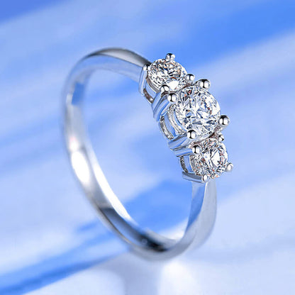Cariniel 4 Carat Round Brilliant Three-stone Moissanite Ring