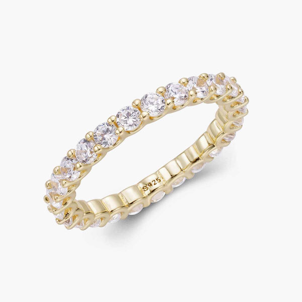 Quirawen gold eternity ring with round moissanite stones in U-prong setting