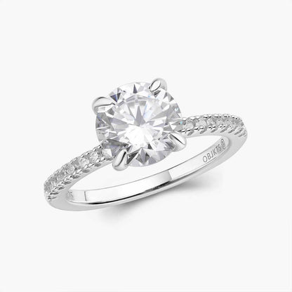 Ysinwen ring with a brilliant round moissanite stone and pave band solitaire design