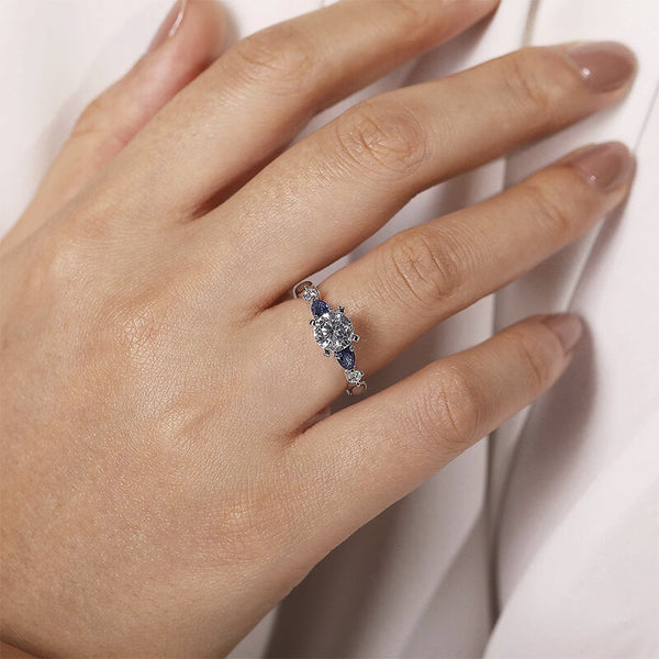 Duvriel 3 Carat Round Brilliant Three-stone Moissanite Ring in 925 Silver