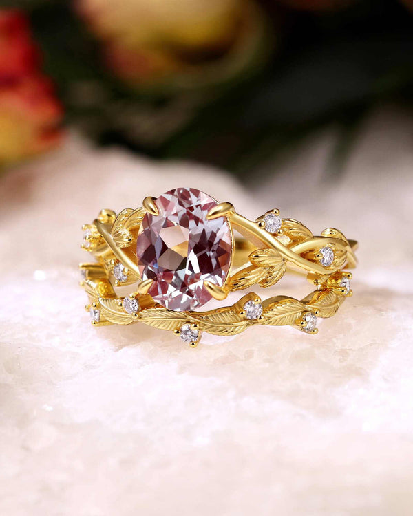 Ulindiel stackable ring set with oval lab-grown alexandrite and moissanite accents on gold leaf-inspired bands