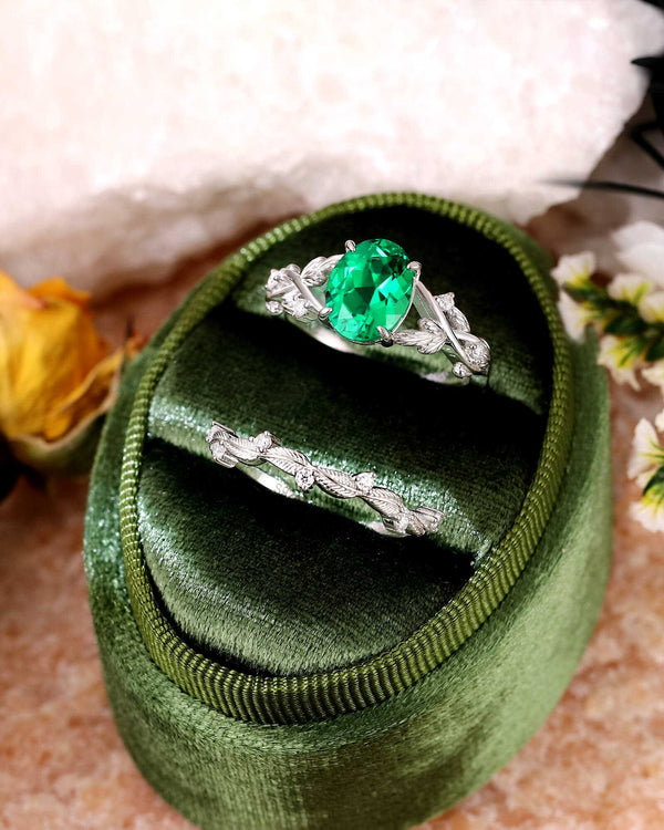 Stackable ring set with oval lab-grown emerald and moissanite accents in elegant silver bands