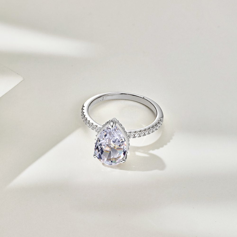Uvariel 3 Carat Pear Hidden Halo Moissanite Ring in 925 Silver