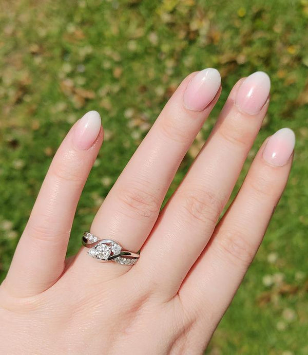 Moraviel 2 Carat Round Brilliant Three-stone Moissanite Ring in 925 Silver