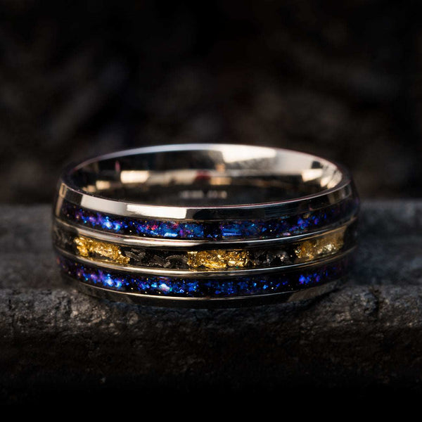 Cosmic-inspired wedding ring with star-patterned alexandrite, Gibeon meteorite fragments, and 22k gold leaf detailing