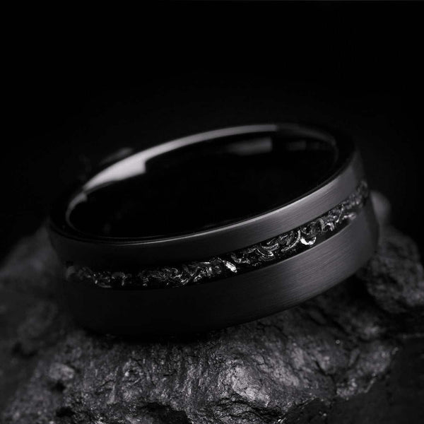 Yiloria black ring with genuine meteorite inlay and eternity design on textured surface
