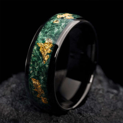 Delthriel ring with green moss agate and gold flakes on black band, elegant stackable design