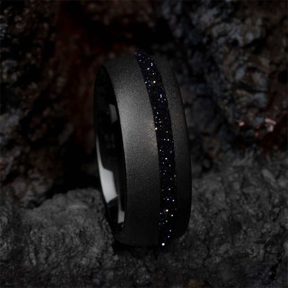 Black tungsten carbide ring with deep blue star Sandstone gemstone and sandblasted finish