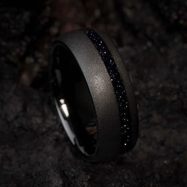 black tungsten carbide ring with deep blue star sandstone and sandblasted finish
