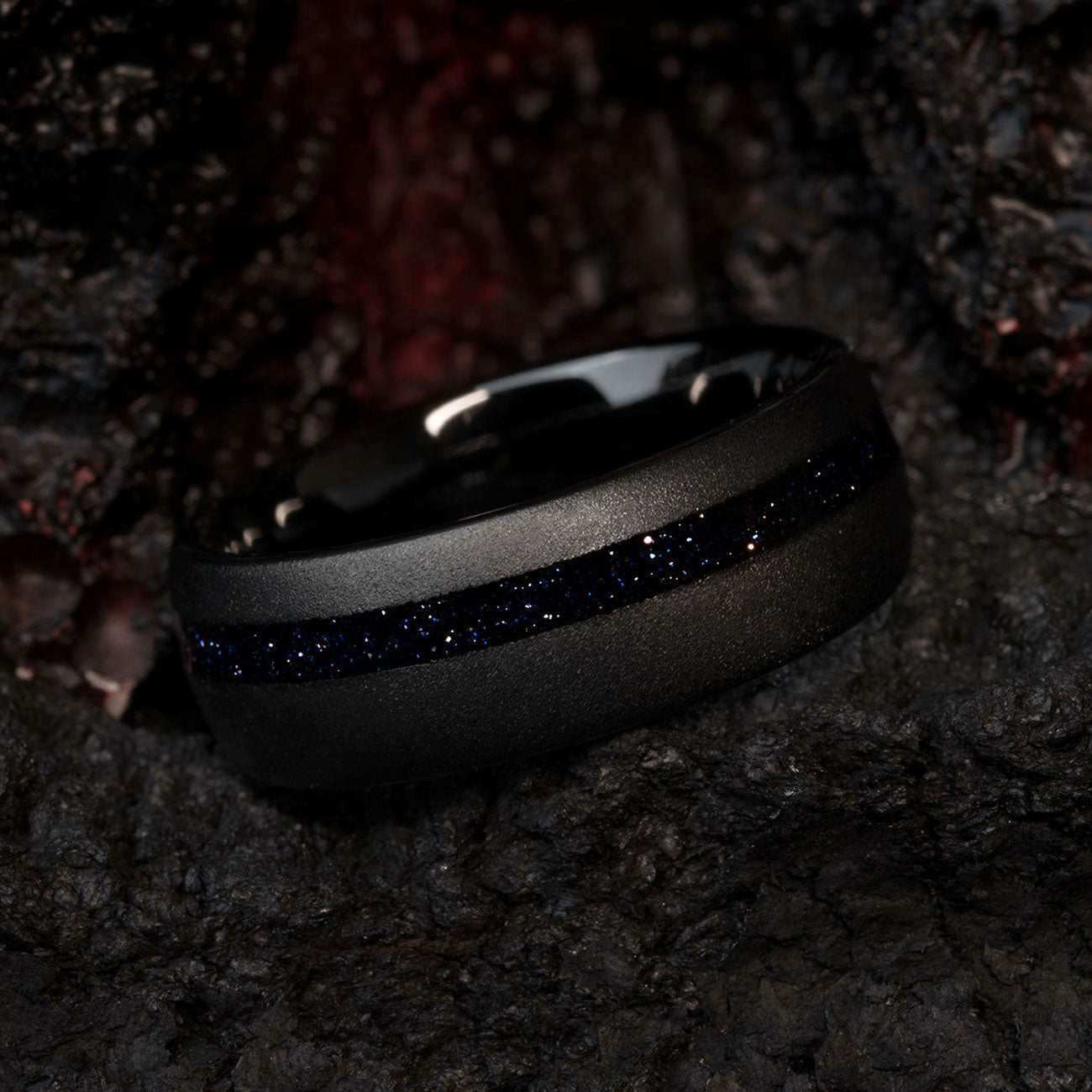 black tungsten carbide ring with deep blue star Sandstone gemstone and sandblasted finish