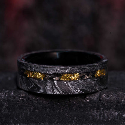 8mm eternity wedding ring with silver swirl carbon fiber, Gibeon meteorite, 22k gold foil inlays, and black tungsten sleeves