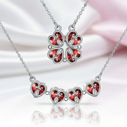 Hesperiel pendant necklace with four interlocking red heart-shaped clovers and 0.5-carat moissanite gemstone