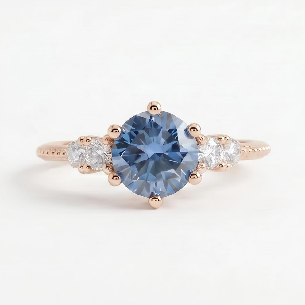 Gloraviel three-stone engagement ring with 1-carat round blue moissanite center and classic design