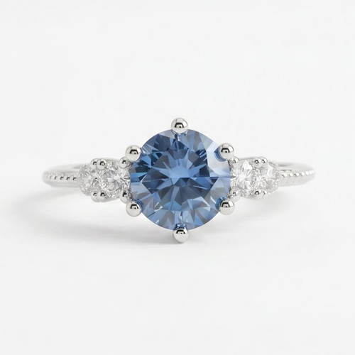 Gloraviel three-stone engagement ring with 1-carat round blue moissanite centerpiece and classic design